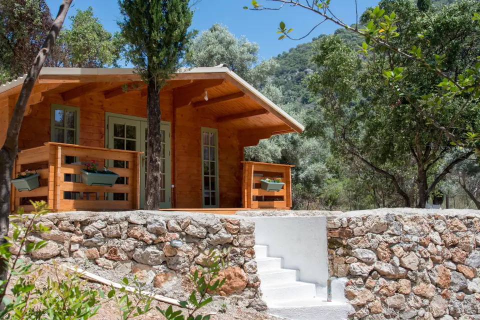 Wooden house sea view accommodation at Mikros Gialos beach, Lefkada Greece